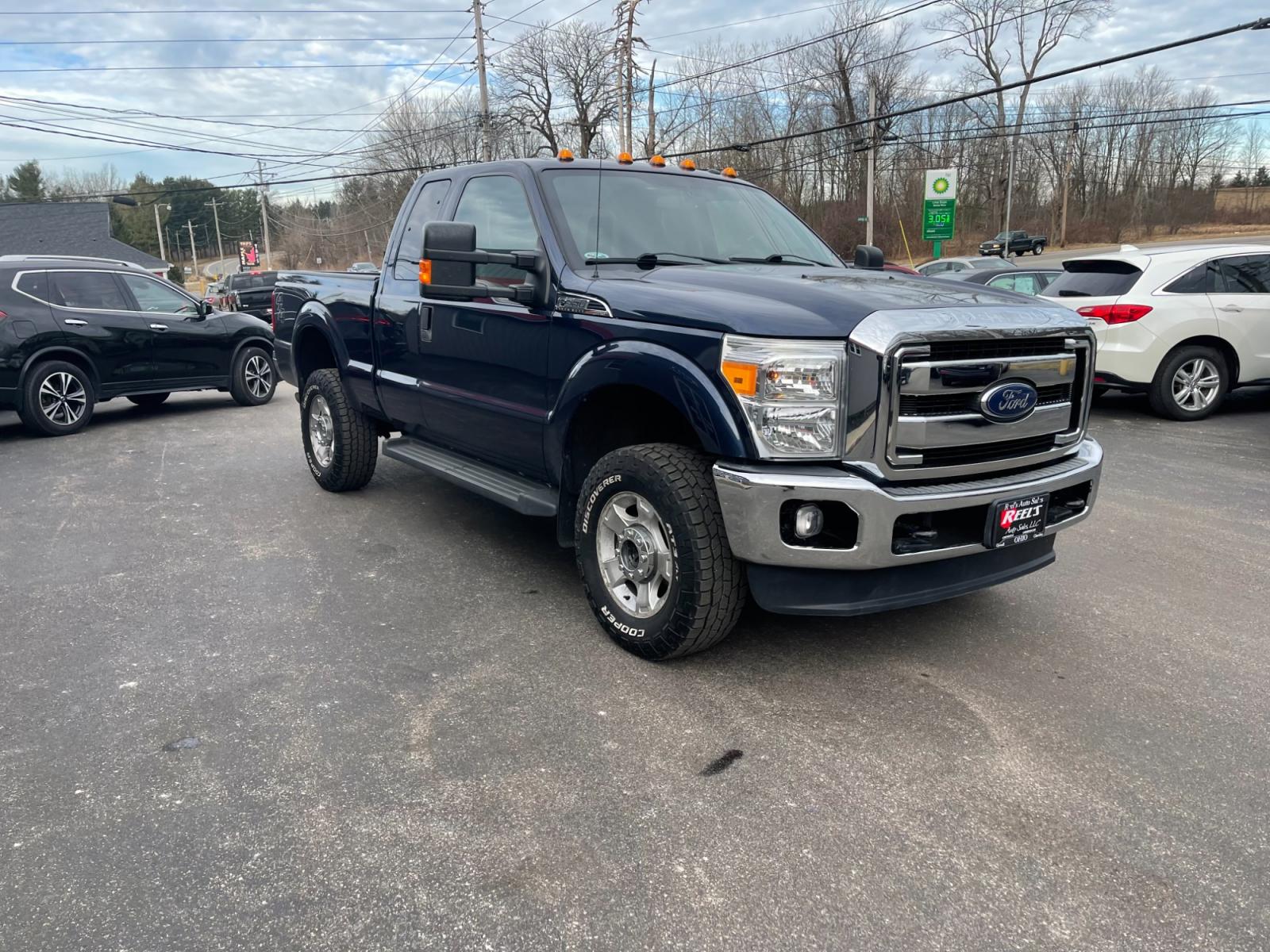 2015 Blue /Gray Ford F-350 SD XLT SuperCab Long Bed 4WD (1FT8X3B68FE) with an 6.2L V8 OHV 16V engine, 6-Speed Automatic transmission, located at 11115 Chardon Rd. , Chardon, OH, 44024, (440) 214-9705, 41.580246, -81.241943 - This 2015 Ford F-350 XLT Supercab 4WD, equipped with a robust 6.2L V8 engine and a 6-speed automatic transmission, offers substantial power and capability, suited for both work and recreational towing needs. It ensures driver comfort with a power driver's seat and power-adjustable pedals, coupled wi - Photo #2